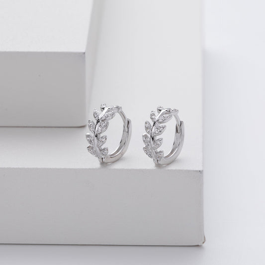 Silver earrings in the shape of a leaf
