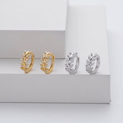 Silver earrings in the shape of a leaf