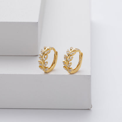 Silver earrings in the shape of a leaf